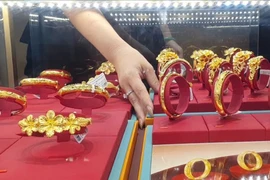 Vàng nhẫn 9999 áp sát vàng miếng, lập kỷ lục 164,5 triệu đồng/lượng