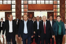 Tổng Bí thư, Chủ tịch nước Nguyễn Phú Trọng, Thủ tướng Nguyễn Xuân Phúc, Chủ tịch Quốc hội Nguyễn Thị Kim Ngân đến dự Hội nghị. (Ảnh: Trí Dũng/TTXVN)