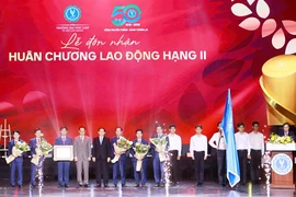 Trường Đại học Luật TP.HCM đón nhận Huân chương Lao động hạng Nhì