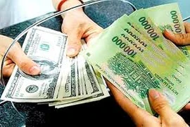 NHNN bất ngờ tăng tỉ giá bình quân liên ngân hàng