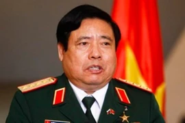 Sáng 25-7, Bộ trưởng Phùng Quang Thanh về đến Việt Nam 