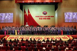 Ban Chấp hành Trung ương Đảng khóa XIII ra mắt đại hội. Ảnh: TTXVN