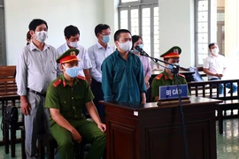 Các bị cáo tại phiên tòa sơ thẩm ngày 1-6.