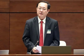 Bộ trưởng Bộ KH&CN Huỳnh Thành Đạt trả lời chất vấn của các đại biểu.