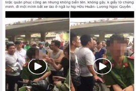 1 thanh niên mặc đồ công an có biểu hiện say, chặn xe 