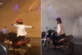 Nữ tài xế 'hồn nhiên', vừa lái xe... vừa dang tay ra múa