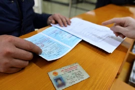 Chính phủ đốc thúc việc thực hiện bỏ sổ hộ khẩu