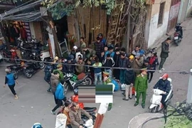 Tài xế mặc áo Grab tử vong giữa đường phố Hà Nội