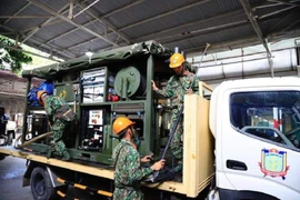 Hình ảnh Binh chủng Hóa học tẩy độc ở Công ty Rạng Đông