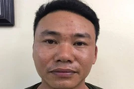 Nguyễn Mạnh Quân tại cơ quan điều tra. Ảnh: CACC
