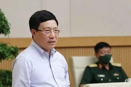 Phó Thủ tướng Thường trực Phạm Bình Minh, Chủ tịch Uỷ ban ATGT Quốc gia chủ trì Hội nghị. Ảnh: TTXVN