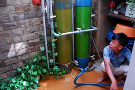 Dùng nước bẩn trong khu dân cư 