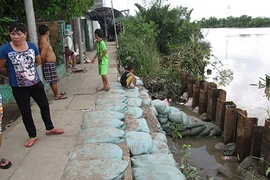 Hàng ngàn hộ dân thấp thỏm chờ di dời