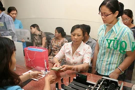 Xem xét nâng mức cho HS-SV vay vốn lên 1,35 triệu đồng/tháng