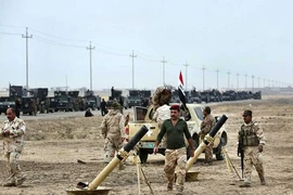 13 nước chống IS họp trong khi IS tăng viện ở Mosul