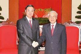 Kiên trì phát triển quan hệ hợp tác Việt-Trung