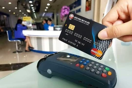 Thanh toán không dùng tiền mặt: Không dễ! 
