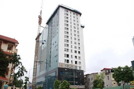Chủ đầu tư phản ứng việc cắt ngọn nhà 8B Lê Trực