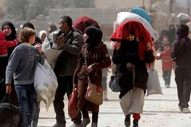 Di tản 12.500 người khỏi vùng chiến sự Đông Ghouta