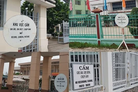 Xã, phường đặt biển cấm chụp ảnh, đúng không?