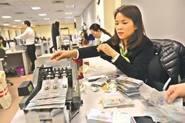 Trung Quốc phá giá nhân dân tệ: Tiền Việt ra sao?