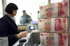 Trung Quốc hạ giá nhân dân tệ để đối phó Mỹ