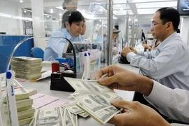 ‘Giải mã’ đồng đôla Mỹ đột ngột nổi sóng lớn