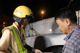 Tăng tiền phạt nhưng phải triệt nạn ‘cưa đôi’ với CSGT