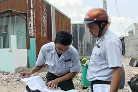 Tiếp tay vi phạm xây dựng có thể bị xử hình sự