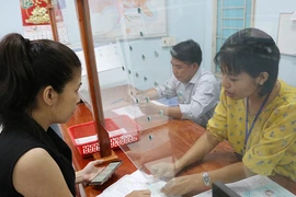 TP.HCM: Cán bộ bị dồn việc khi giảm gần 2.300 người