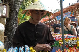 Lưu giữ ký ức tuổi thơ ngày Tết qua chiếc tò he 