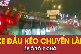 Video: Xe đầu kéo chuyển làn, chèn ép ô tô 7 chỗ trên đường 