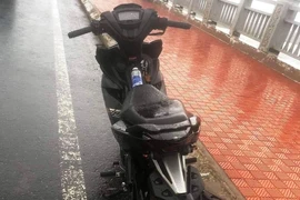 Thấy xe máy trên cầu Cửa Đại, nghi có người tự tử nên dân gọi báo công an