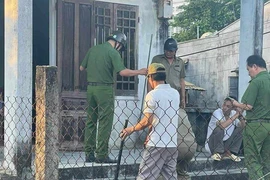 Người tâm thần gây án chết người đang bị công an tạm giữ. Ảnh: CTV