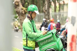 Grab dùng gói 70 tỉ đồng hỗ trợ tài xế ứng phó dịch COVID-19