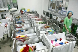 Điều chỉnh mức sinh con, dân được đẻ thoải mái?