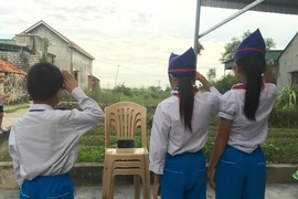 Chùm ảnh: Một khai giảng rất khác ...