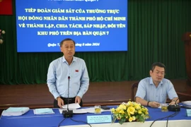 Quận 7 kiến nghị UBND TP.HCM không thu phí, hướng dẫn chuyển đổi giấy tờ sau khi sắp xếp khu phố