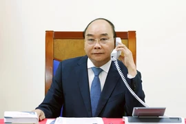 hủ tướng Nguyễn Xuân Phúc tại cuộc điện đàm. Ảnh: VGP