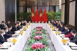 Thủ tướng Phạm Minh Chính hội kiến Thủ tướng Trung Quốc Lý Khắc Cường
