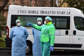 Nhân viên y tế tại Bệnh viện Brescia, vùng Lombardy (Ảnh chụp ngày 13-3). Ảnh: AFP 