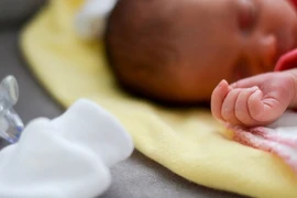 Ảnh minh họa_Cảnh sát Ukraine vừa triệt phá một đường dây buôn bán trẻ em sang Trung Quốc. Ảnh: UNIAN