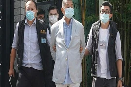 Ông Jimmy Lai bị cảnh sát bắt giữ hôm 10-8. Ảnh: AP