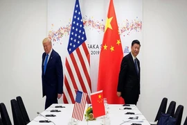 Tổng thống Mỹ Donald Trump (trái) và Chủ tịch Trung Quốc Tập Cận Bình. 