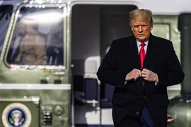 Tổng thống Mỹ Donald Trump ở căn cứ không quân Andrews (bang Maryland) hôm 12-12-2020. Ảnh: AP
