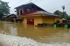 Ngập lụt tại Philippines do ảnh hưởng của siêu bão Surigae. Ảnh: RAPPLER