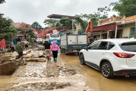 Lũ ống bất ngờ đổ về trong đêm ở xã Minh Lương (Lào Cai) đã làm ba người chết và mất tích. Ảnh: VĂN MINH