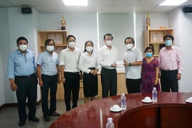 Ban Tuyên giáo Thành ủy TP.HCM đến thăm báo Pháp Luật TP.HCM