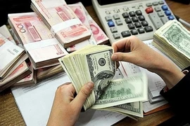 Mua bán vàng miếng và USD, bị phạt 170 triệu đồng