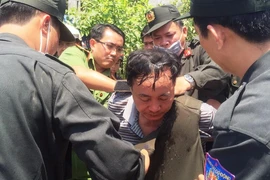 NGhi can TRương Văn Ai bị khống chế
